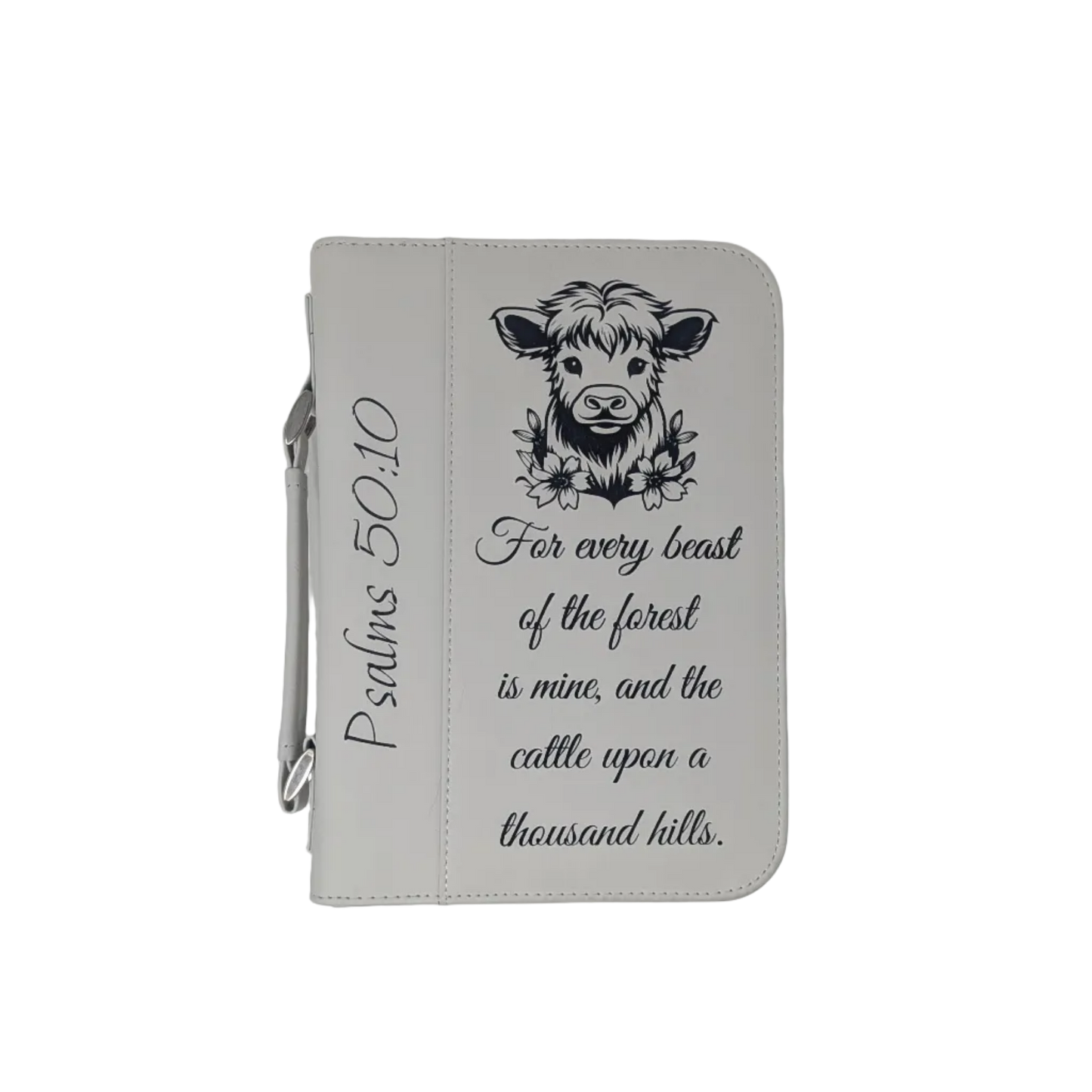 White Leatherette Bible cover with highland cow and psalm 50:10 engraved on the front